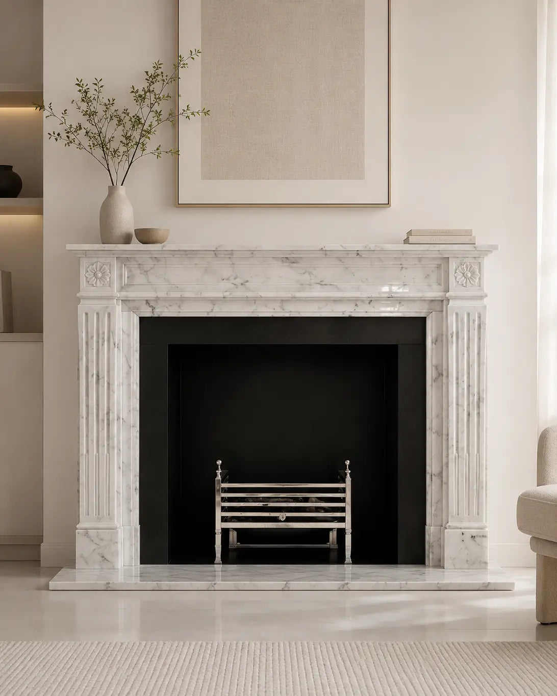 Handcrafted Ziarat White marble fireplace surround with fluted columns, carved rosettes, and polished natural stone finish.