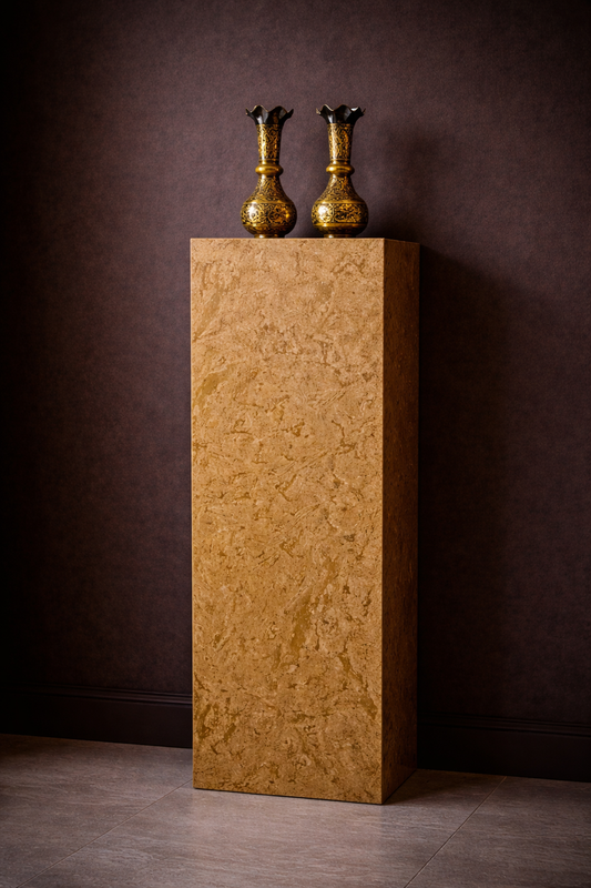 Front view of Desert Gold marble plinth with polished finish, featuring mitered corners and a clean architectural form