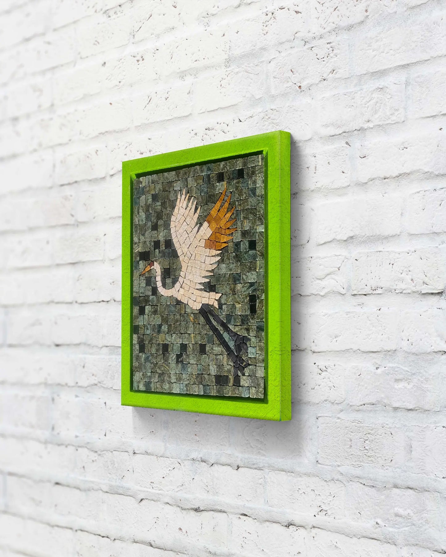 Flight Over Emerald – marble mosaic wall art (Jungle Green, Boticina Cream, Golden, Jet Black) displayed in lime green frame, NIA Collection by Mozeeko,side view
