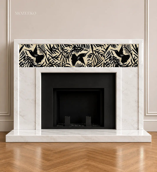 French-style Ziarat White Supreme marble fireplace featuring an inlaid black bird mosaic frieze set within foliage, handcrafted and made to order by Mozeeko.