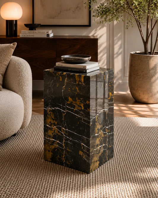 Black and gold marble plinth with polished finish, mitered corners, styled as an accent pedestal