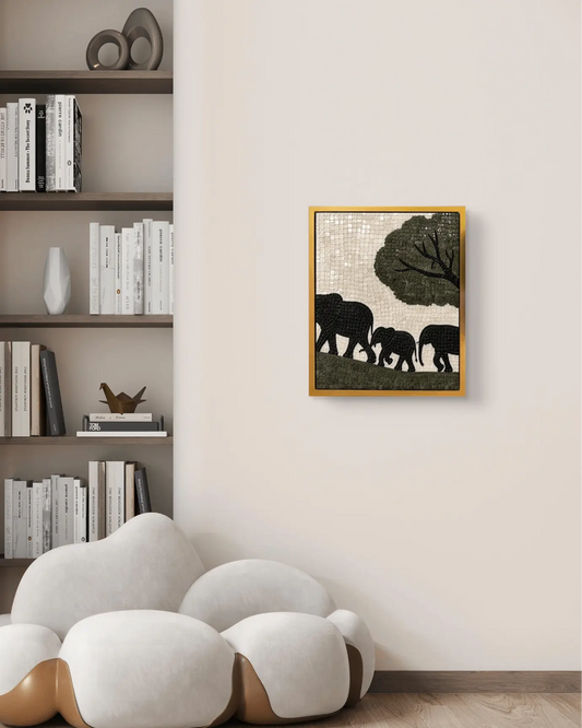 Black elephant family marble mosaic wall art beneath a green tree displayed in a golden frame.