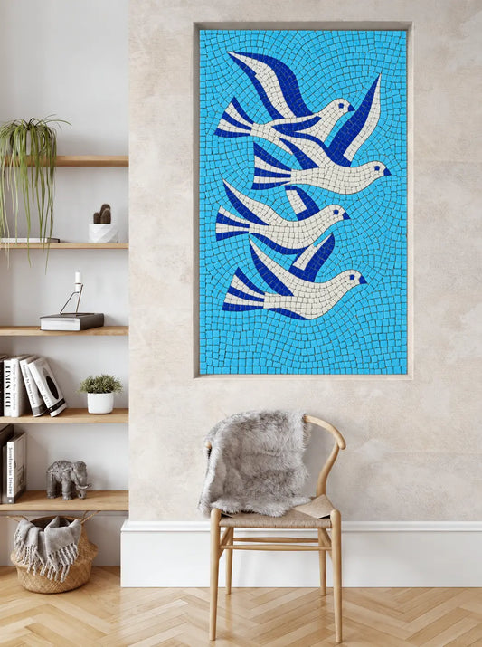 Four blue and white birds in a vitreous glass mosaic wall panel installed in a modern interior.