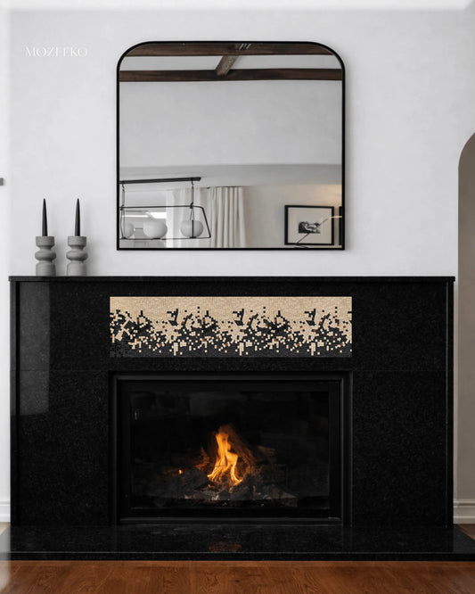 Jet black granite fireplace with handcrafted mosaic inlay panel, featuring a modern architectural design by Mozeeko.