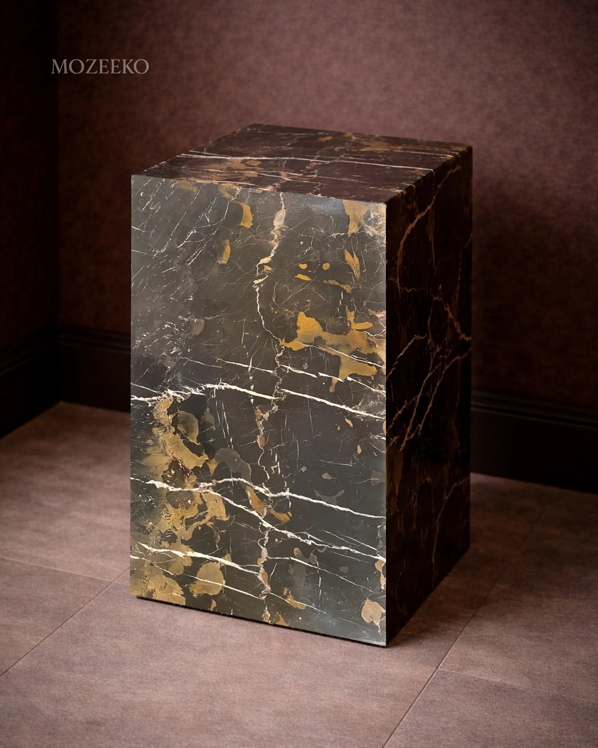 Black and gold marble plinth with polished finish, mitered corners, styled as an accent pedestal