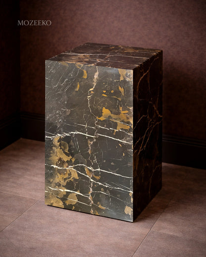 Black and gold marble plinth with polished finish, mitered corners, styled as an accent pedestal
