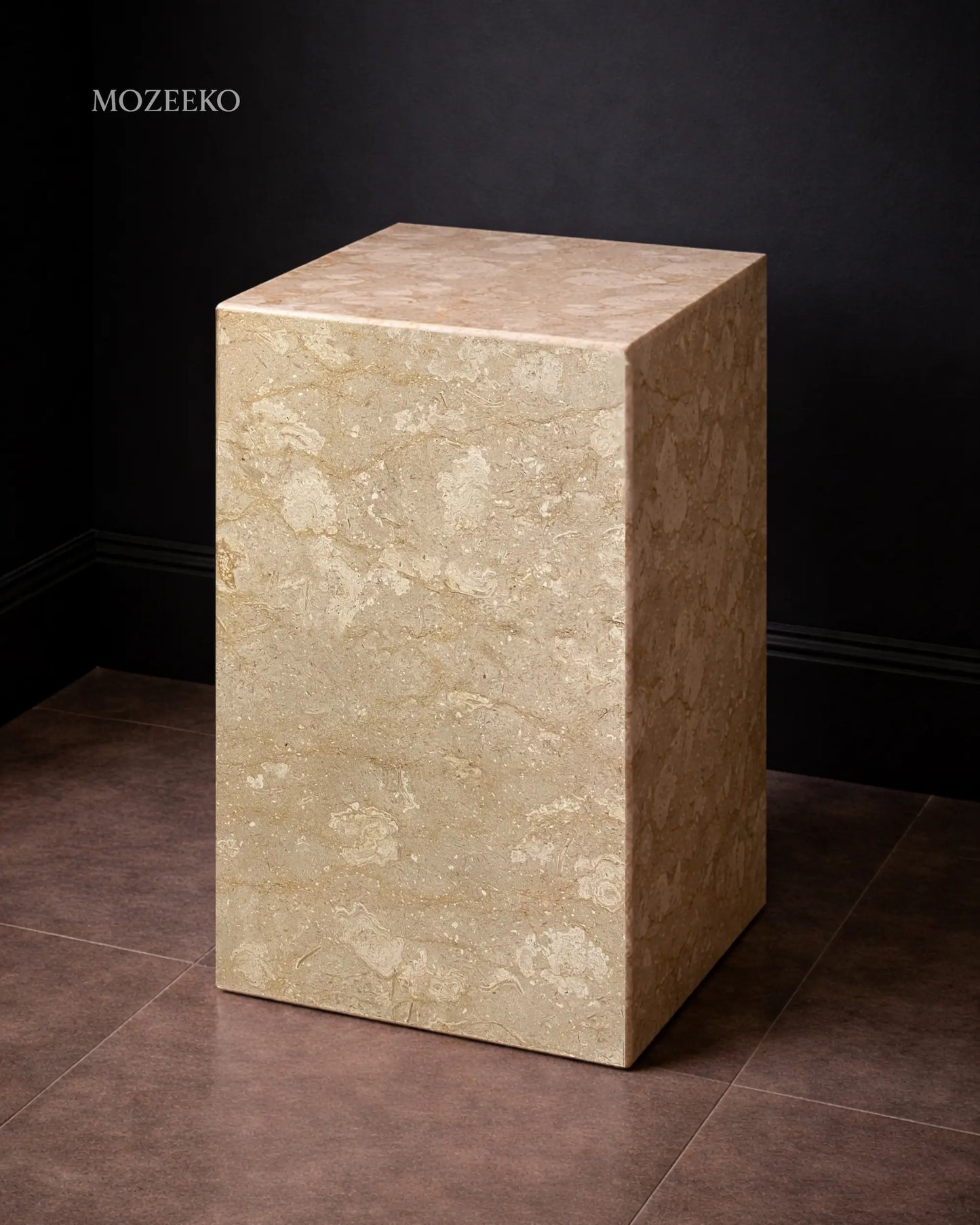 Side view of Tervera marble plinth highlighting hollow mitered construction and natural stone patterning