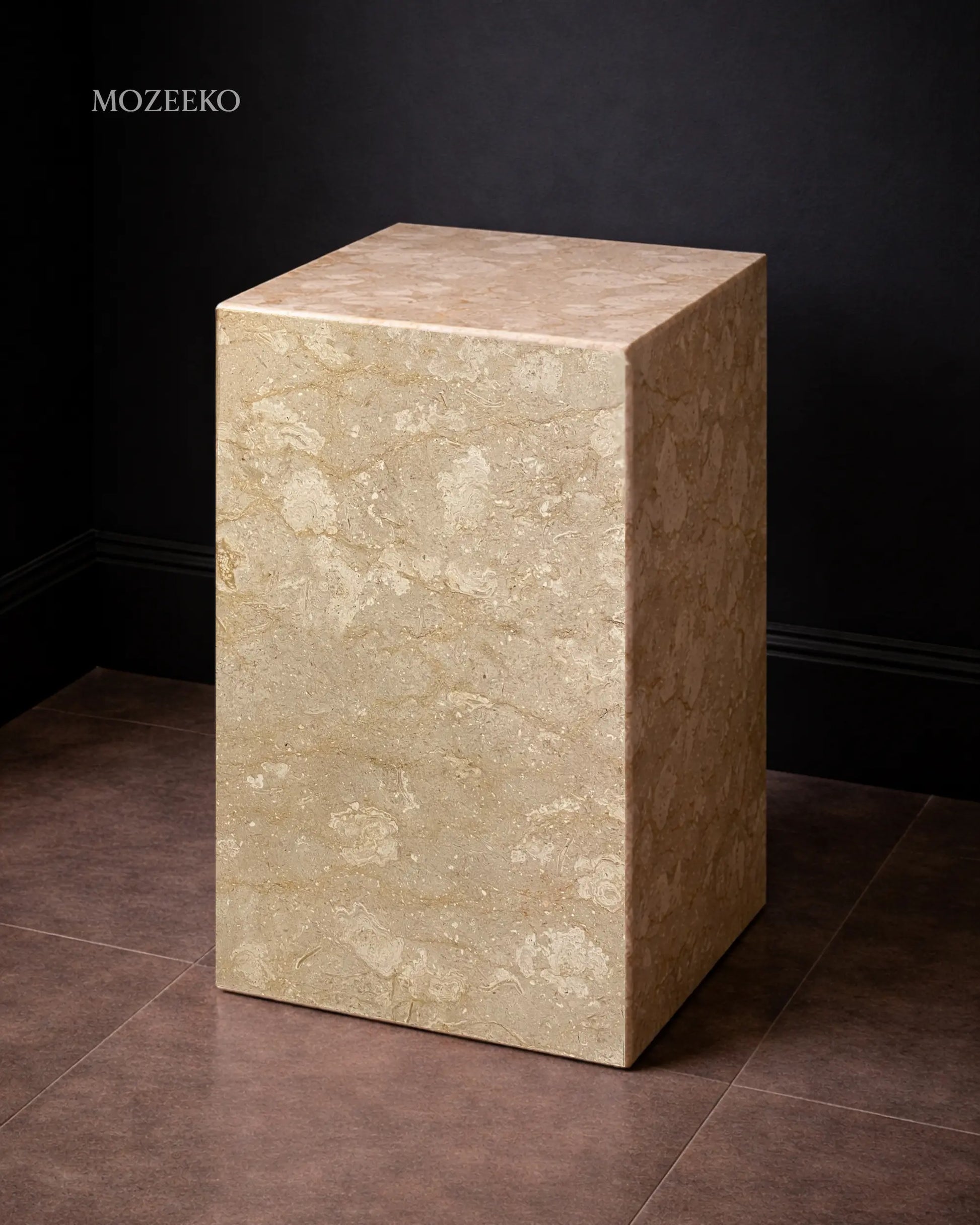 Side view of Tervera marble plinth highlighting hollow mitered construction and natural stone patterning