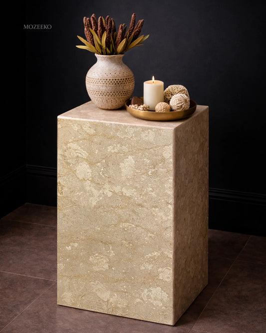 Tervera marble plinth with mitered corners and warm beige stone texture, shown as a sculptural accent pedestal