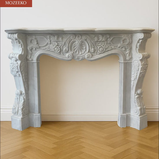 “Video of hand-carved Super White marble fireplace by Mozeeko, showcasing French Rococo carving details, flowing curves, and premium stone craftsmanship.”