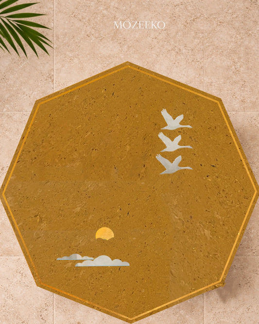 Octagonal golden marble table top with Kamoor white bird and cloud inlay and brass sun motif
