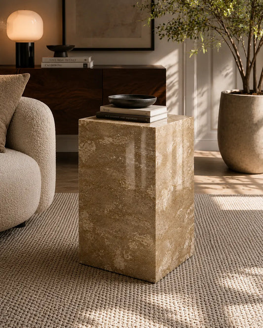 Tervera marble plinth with mitered corners and warm beige stone texture, shown as a sculptural accent pedestal