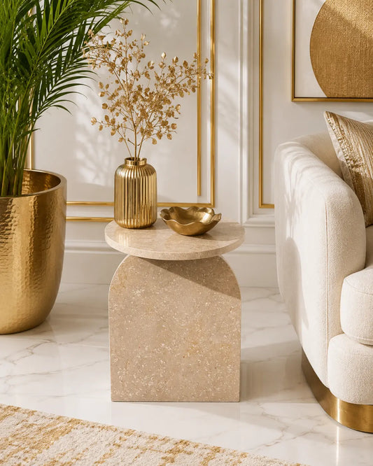 "Cream Tippi marble accent table with round top and wide sculptural base – handcrafted, 19 inches tall and 15.75 inches diameter."