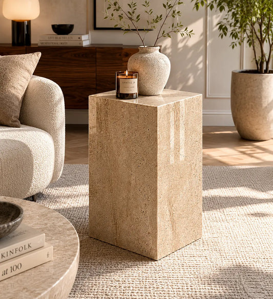 Travertine marble plinth with mitered corners and architectural form, shown as a sculptural accent pedestal