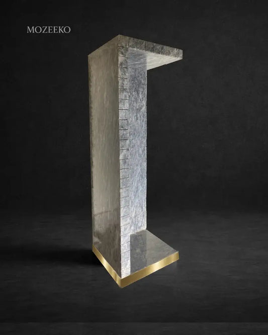 Ziarat grey marble plinth with brass strip detail, handcrafted architectural pedestal by Mozeeko
